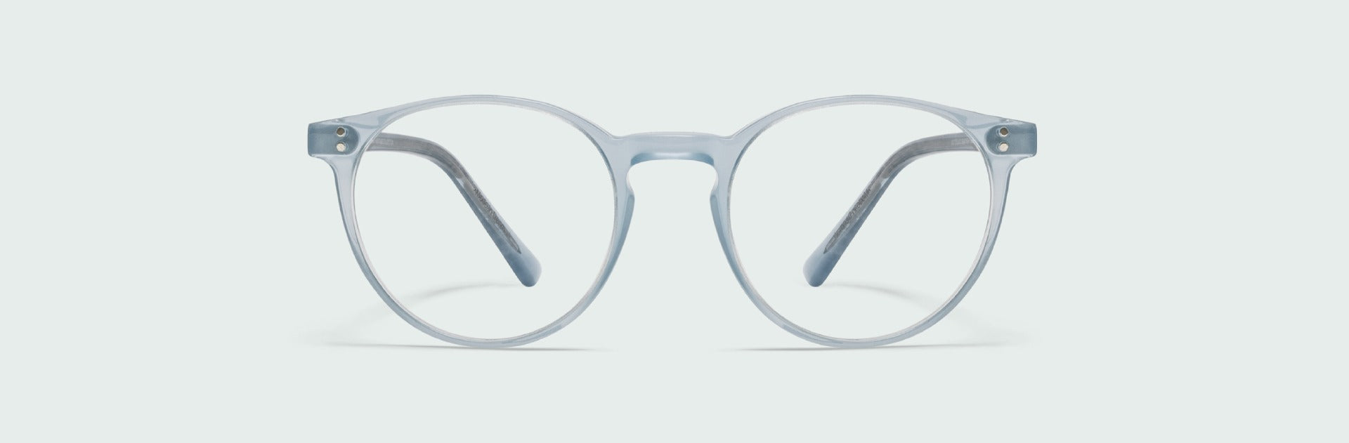 Pair of eyeglasses with transparent frame