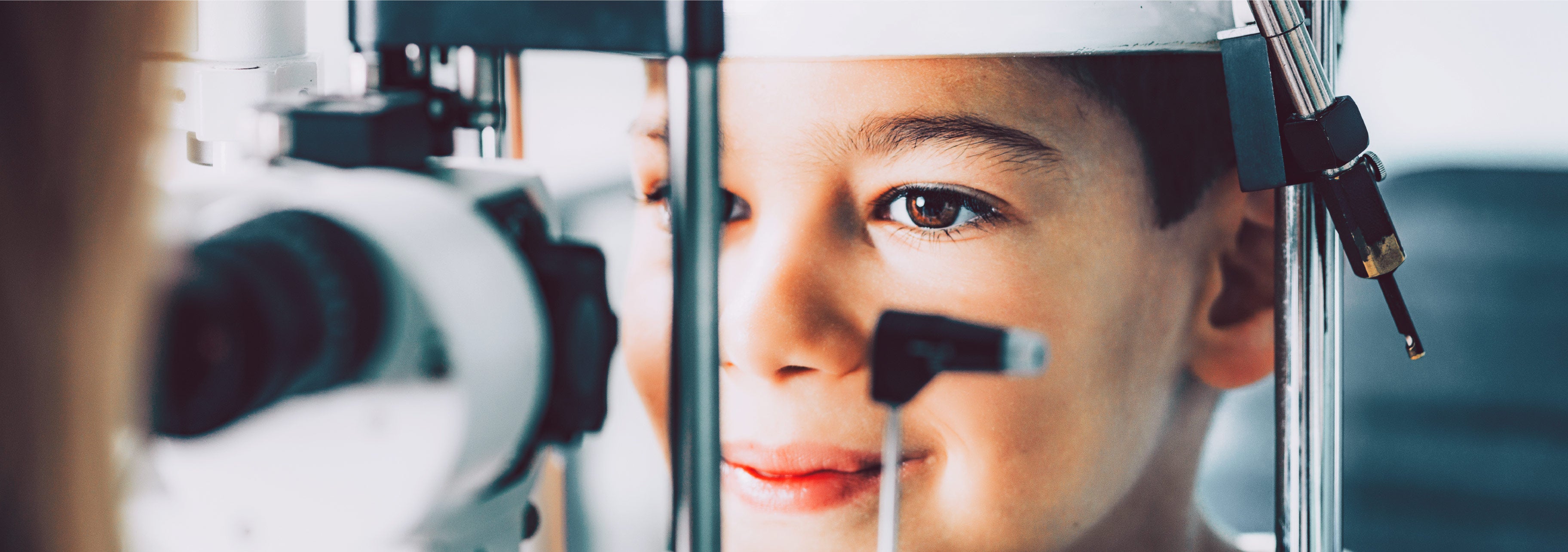 A child during an eye exam at IRIS