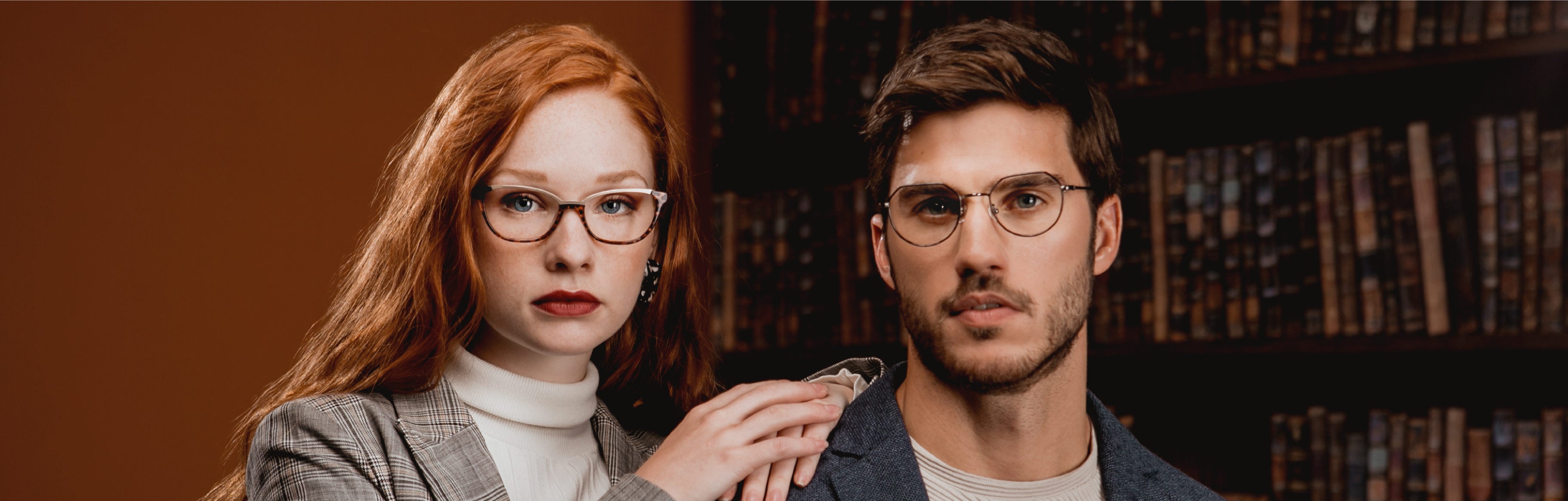 A woman is wearing Seraphin Gramercy glasses and a man is wearing Seraphin Langford glasses