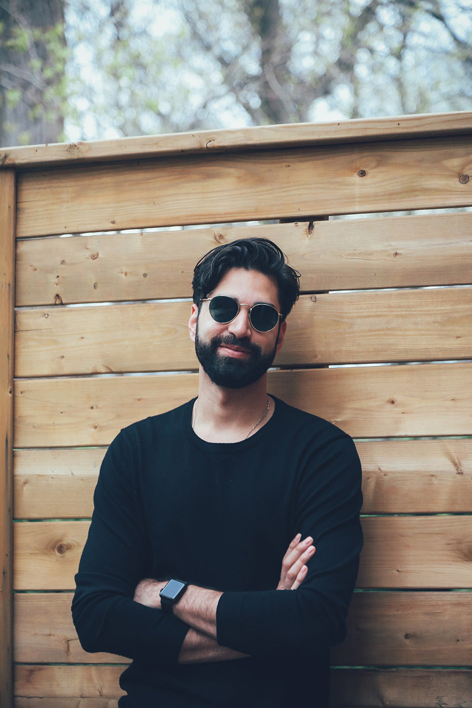 Men smiling wearing glasses