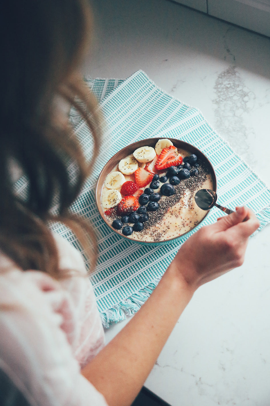 Smoothie bowls strawberries banana blueberries