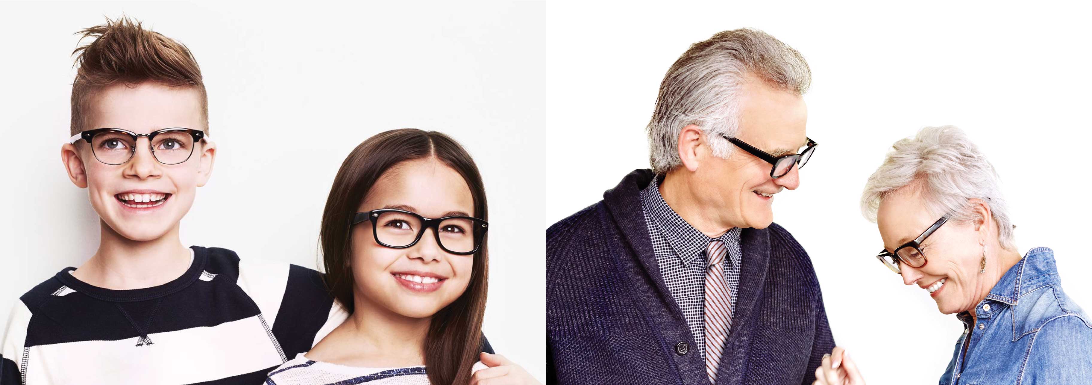 Two small children and two elder are wearing glasses and smiling